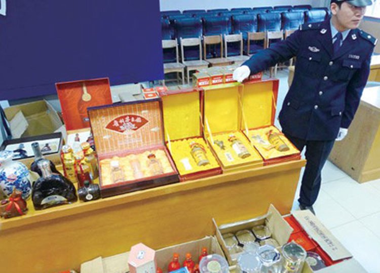 “席卷”烟酒店两月盗百万　广西南宁警方抓获3名盗贼（图）